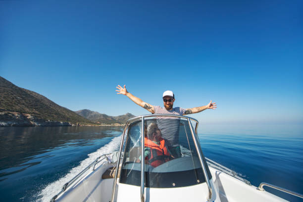 istock Father and son yachting 1318169036