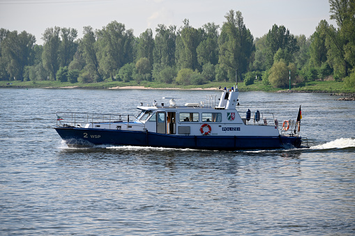 Duesseldorf, Germany, May 13, 2021 - Boat of the water police on the Rhine in Duesseldorf