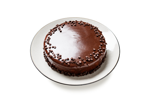 Layered chocolate cake isolated on white background