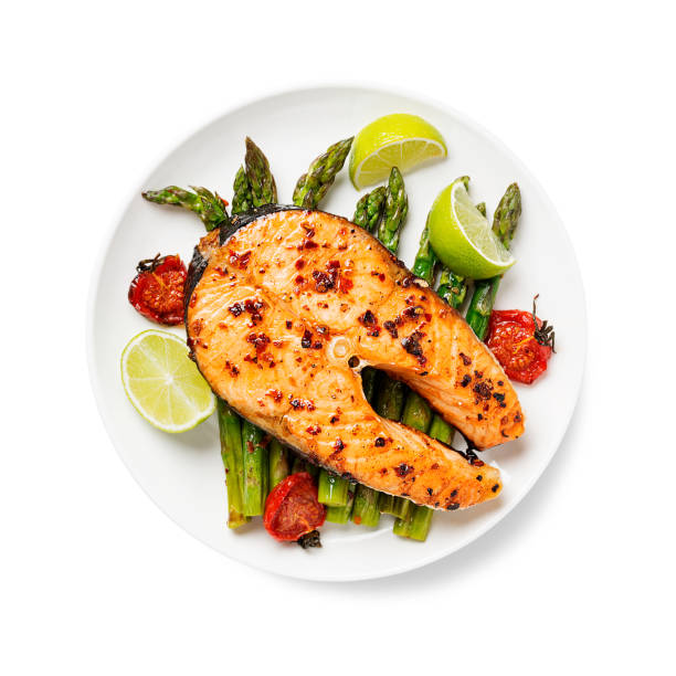 istock Grilled salmon steak with asparagus and tomatoes cherry 1318172588