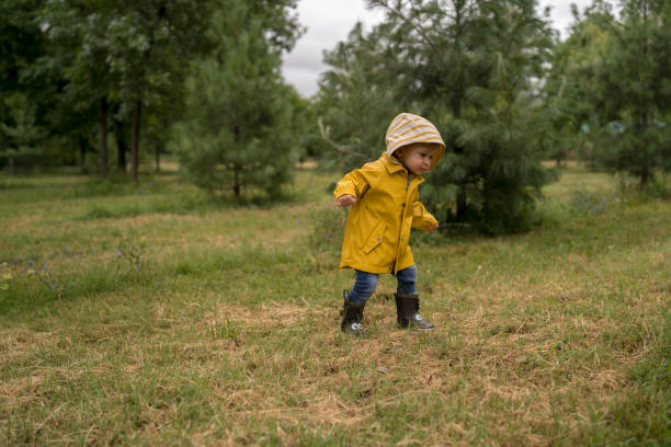 istock Little boy walking outdoors 1318173540
