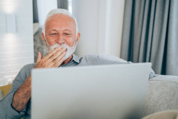 istock Cheerful man having video call at home. 1318178064