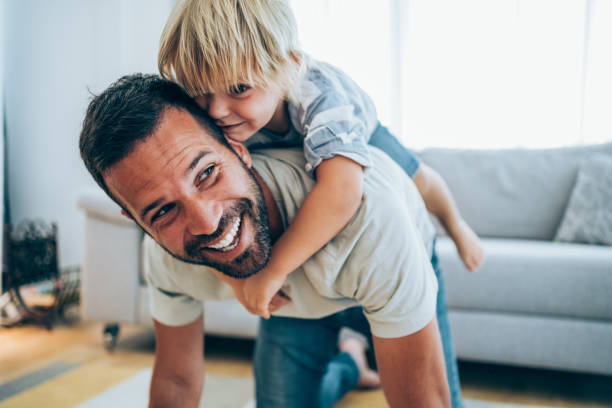 istock Father and little son at home. 1318178073