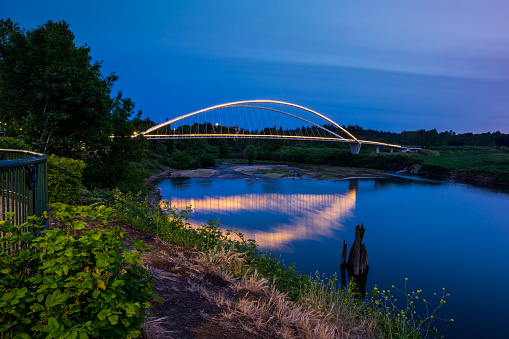 Minto Island pedestrian Bridge in Salem Riverfront park, Oregon, in twilight