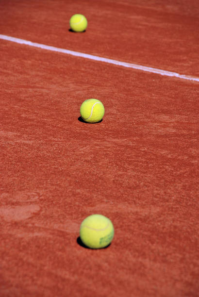 istock Tennis balls on the ground 1318191215