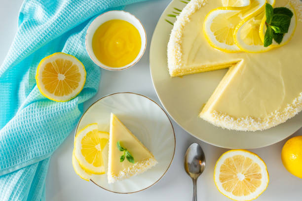 istock Lemon biscuit dessert decorated coconut flake. Delicate cake with white cream cheese. 1318191368