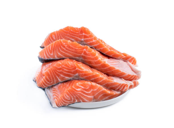 istock Fresh salmon steak slices isolated on white 1318192149