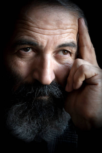 istock Close Up Portrait Mature Turkish Man Hand on Face 1318194370