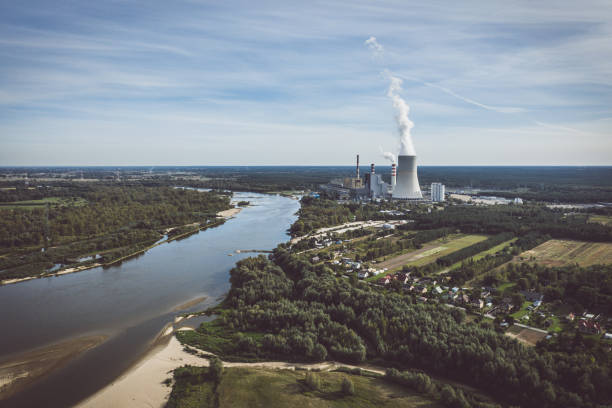 istock Power station under moody cloudy sky aerial view 1318195555