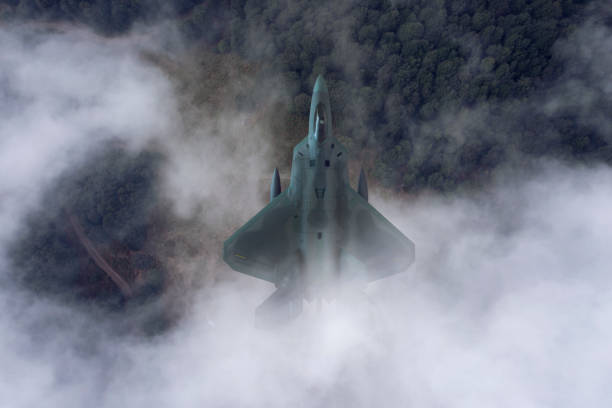 istock Jet fighters flying over the clouds. 1318198489