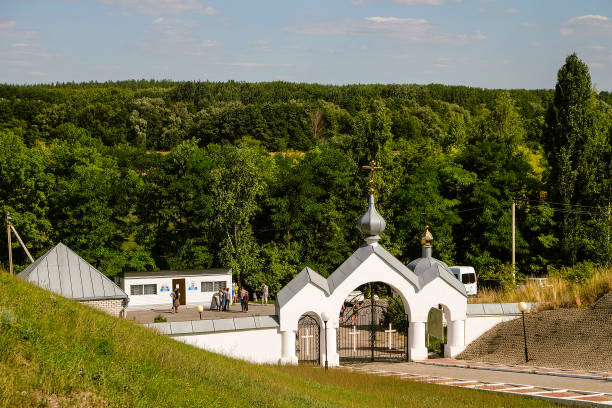 Holy Trinity Holkovsky Monastery. Holki village, Belgorod region, Russia - August 08, 2020: Entrance and exit in historical and architectural complex Holy Trinity Holkovsky Monastery. belgorod photos stock pictures, royalty-free photos & images
