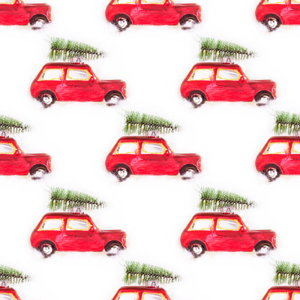 red toy car with green fir tree repeat seamless pattern on white background. christmas and new year holidays celebration wrapping paper concept - new years eve christmas paper christmas fir tree imagens e fotografias de stock