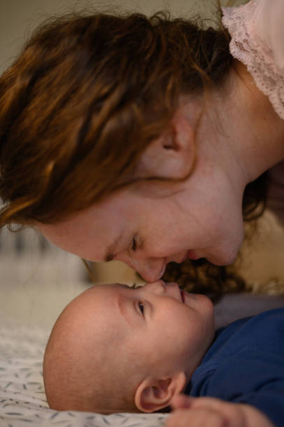 istock Mother playing and bonding with her baby boy at home 1318204675