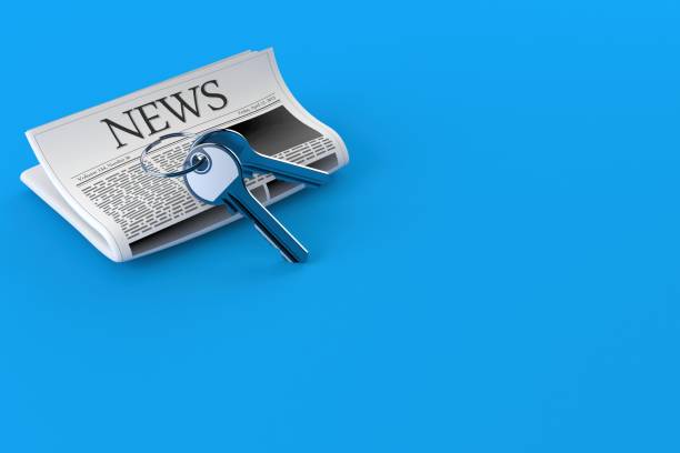istock Door keys with newspaper 1318204751
