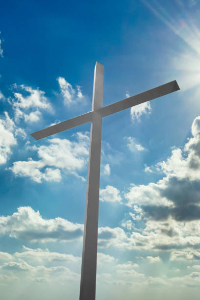 istock Christian Cross Silhouette at Sunset 1318204869