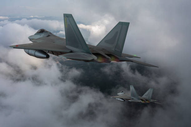 istock Jet fighters flying over the clouds. 1318205569