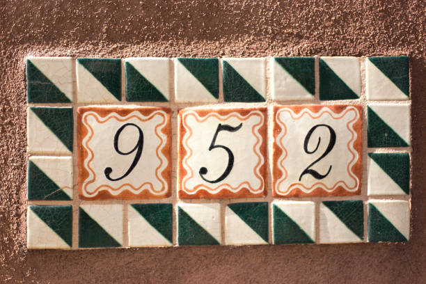 istock Ceramic Number 52 Street Address Tiles, Brown Wall 1318207984
