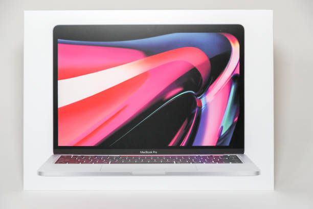 Apple Mac book pro 13 inch M1 touch bar laptop. stock photo