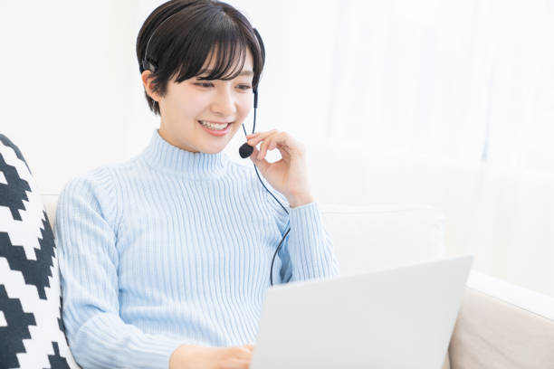 istock young asian woman studying with a PC,correspondence course 1318218953