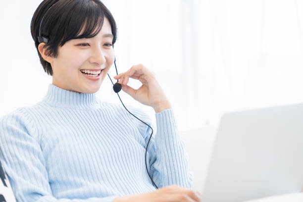 istock young asian woman studying with a PC,correspondence course 1318218993
