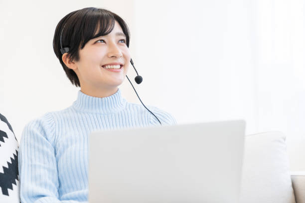 istock young asian woman studying with a PC,correspondence course 1318218998