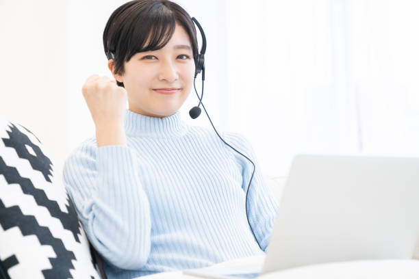 istock young asian woman studying with a PC,correspondence course 1318219008