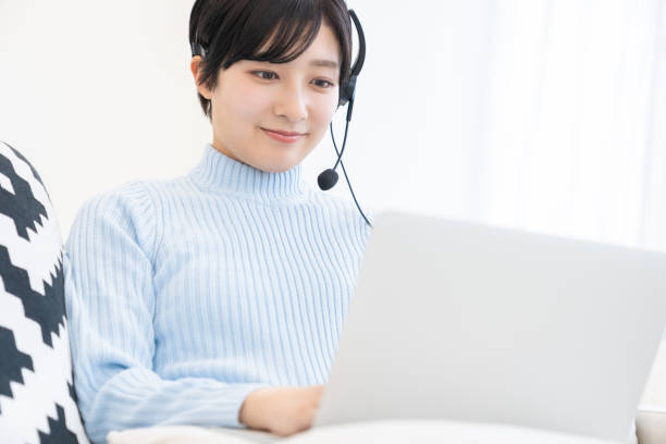 istock young asian woman studying with a PC,correspondence course 1318219041