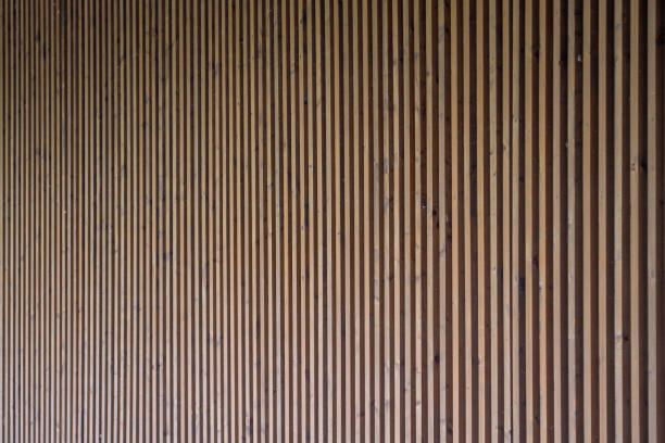 istock Vertical wooden boards wall. Abstract modern surface 1318235459