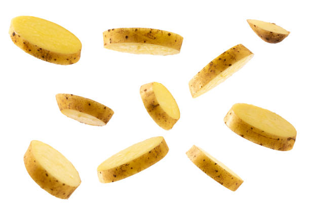 istock raw potatoes flying isolated on white background 1318236251