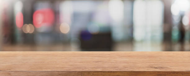 istock Empty wood table top and blurred coffee shop and restaurant interior background - can used for display or montage your products. 1318241466