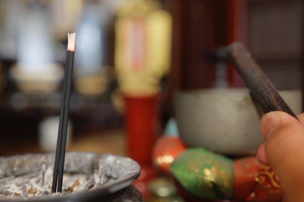 Buddhist altar incense stock photo
