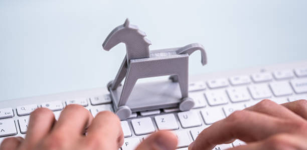 istock Trojan Horse Computer Virus Crime Attack 1318254082
