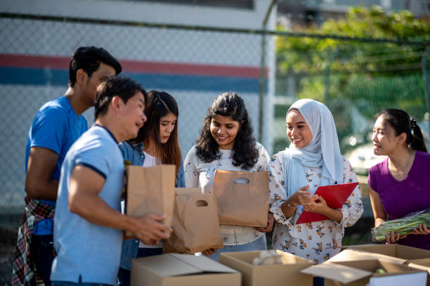 istock Small multi-ethnic group of people working on humanitarian aid project 1318256935