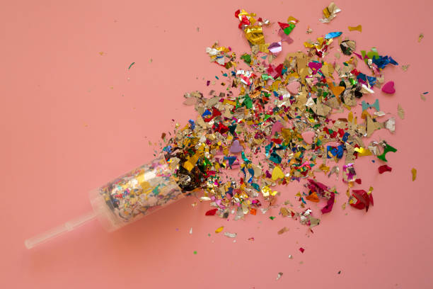 istock Multicolored sparkling candy on a pink background. Candy for your merry holiday. 1318261029
