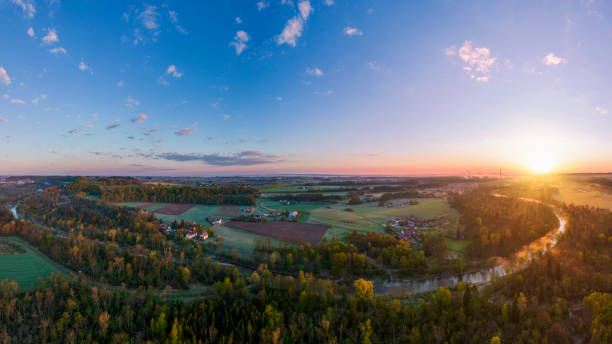 istock River Alz, outflow from Chiemsee in Bavaria at sunrise 1318262083