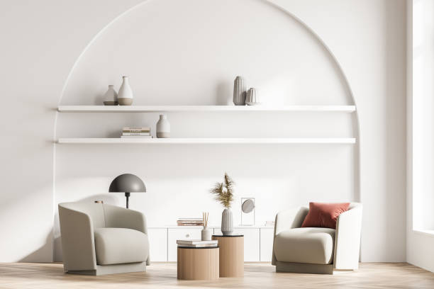 istock Modern living room interior with two armchairs and bookshelf niche arch, commode, lamp. Reading and relax concept. No people. 3d rendering. 1318264210