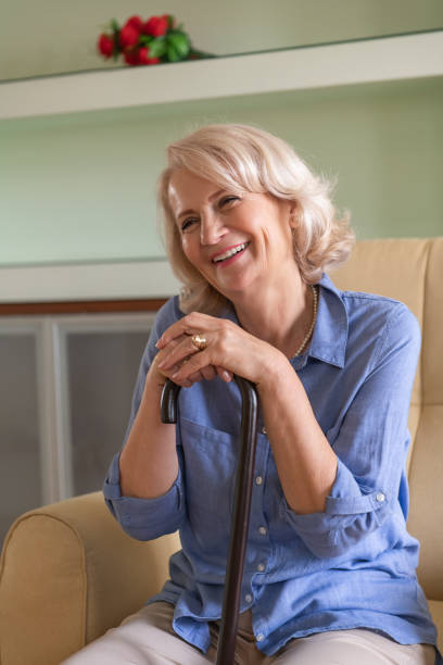 istock Senior Woman is Sitting at Home in Deep Thoughts. 1318264759