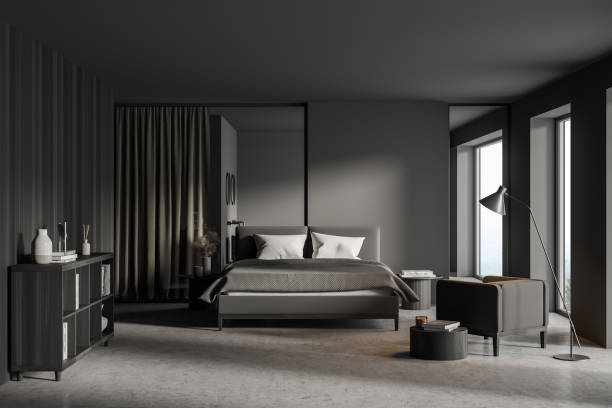 istock Dark bedroom interior with bed and bathroom 1318264768