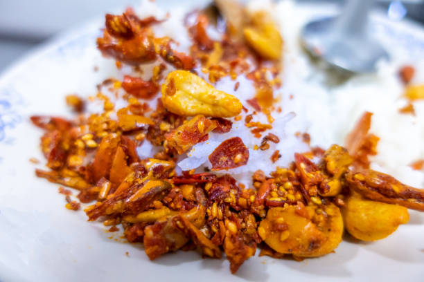 Chili Paste with Cashew Nuts fried pour on top hot rice on white dish