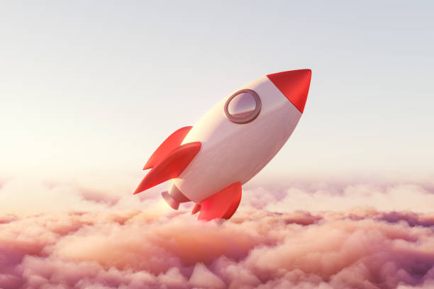 istock Launched rocket is rising above pink pastel clouds 1318267957