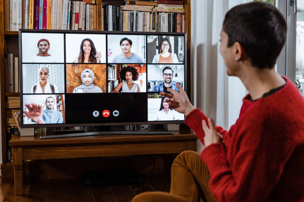 istock Woman in front of a device screen in video conference 1318269315