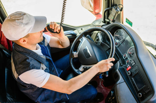 istock Professional truck driver CB talking 1318271457