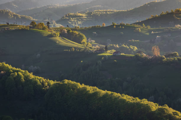 istock Rural mountain landscape with remote Romanian village 1318272658