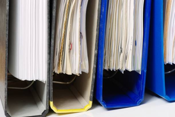 istock Different folders in blue, yellow, and black 1318277519