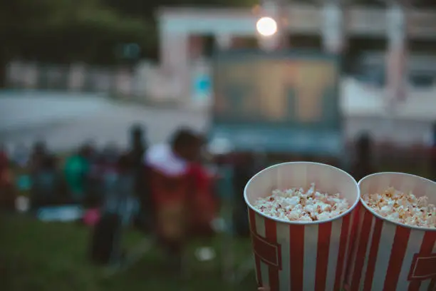 Photo of popcorn close up open air cinema concept