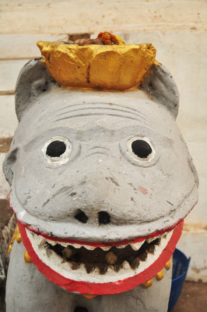 istock Stone singha statue guardian of Wat Aham or Monastery 1318282086