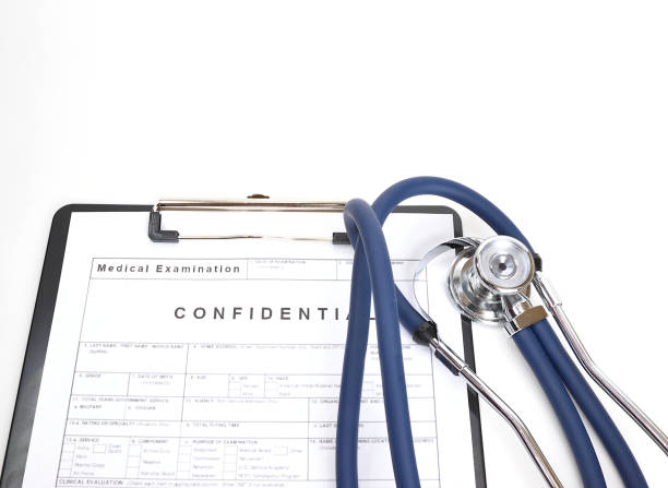 istock Patient examination form next to a stethoscope 1318283646