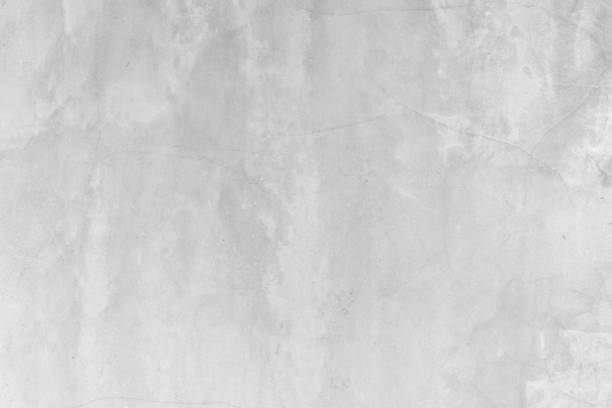 istock Loft-style plaster walls, gray, white, empty space used as wallpaper. Popular in home design or interior design. with copy spaces. 1318289433