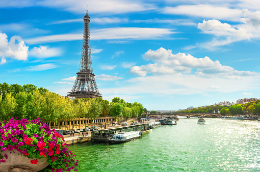 Metal Eiffel Tower the symbol of Paris on river Seine