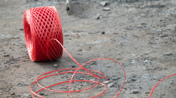 istock Roll of red  rope on the ground 1318299598